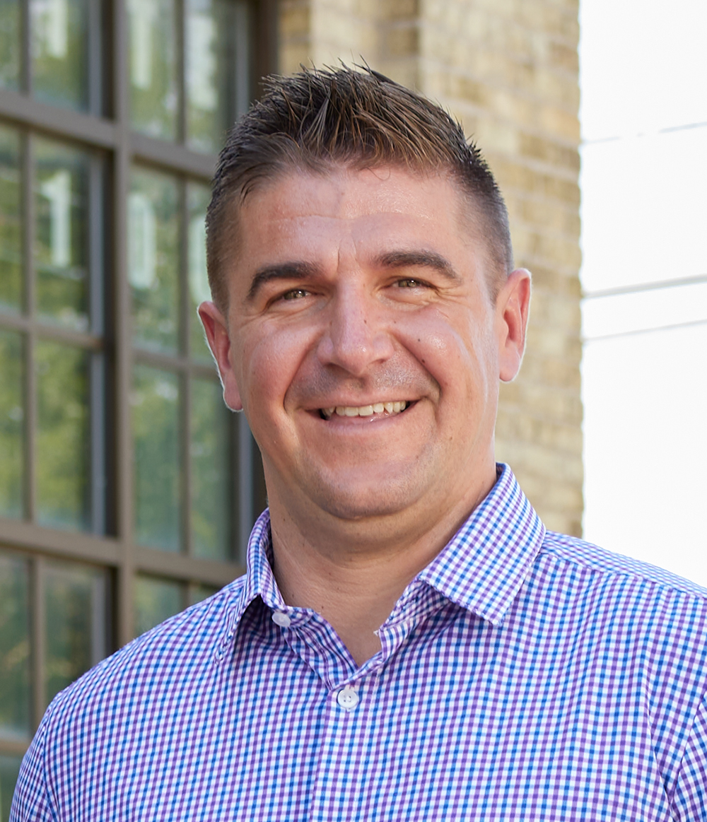 Headshot of Brad Alexejun
